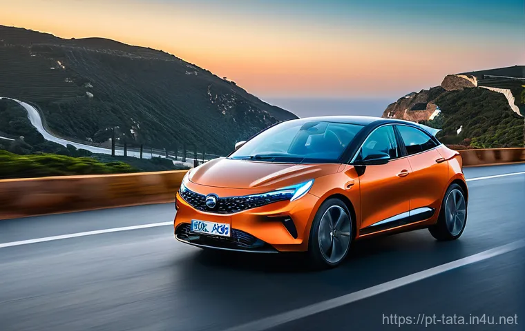 타타 알트로즈와 마루티 발레노 비교 - 0" design, is captured in a dynamic shot driving along a scenic coastal road in Portugal at sunset. ...