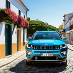 타타 사파리와 지프 컴패스 비교 - **Prompt:** A sleek, modern Jeep Compass 4xe (PHEV) SUV is parked elegantly on a charming cobbleston...
