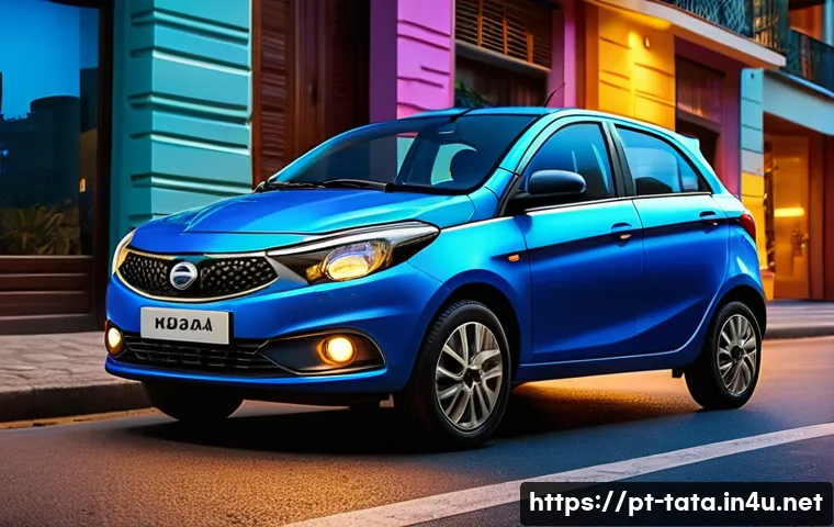 타타 티아고와 쉐보레 스파크 비교 - A modern, sporty Tata Tiago compact car parked on a vibrant Brazilian city street at dusk, showcasin...